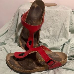 Used Birkenstock Red between the toe shoes size 9